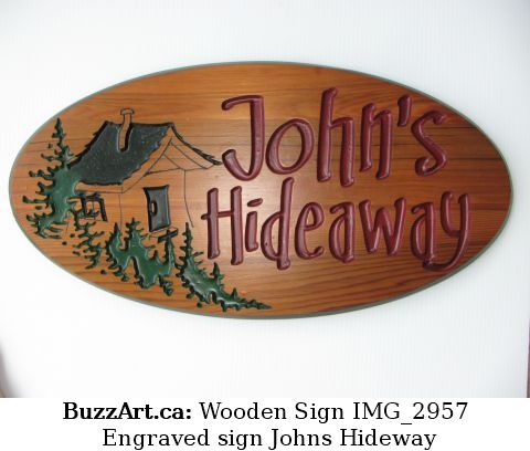 Engraved sign Johns Hideway